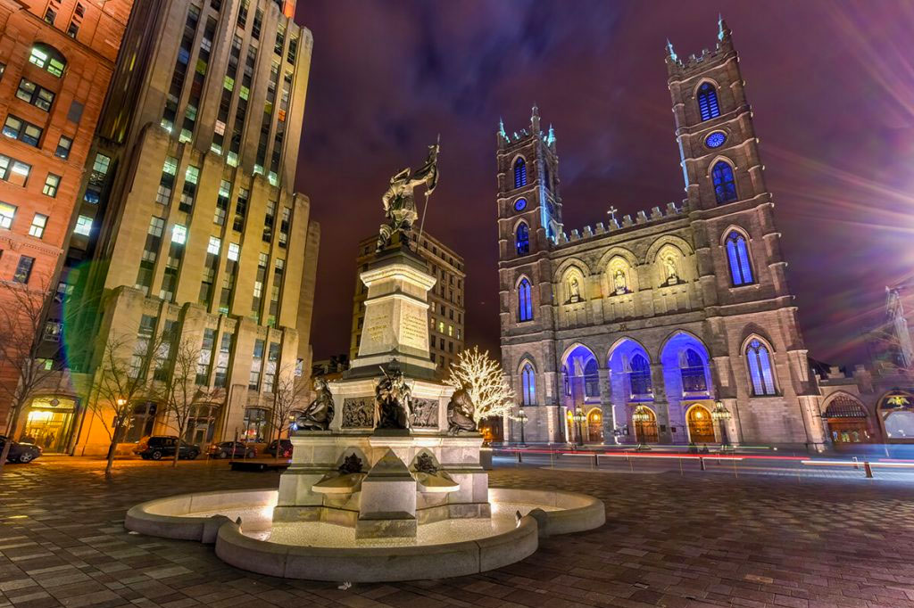 Luxury-Montreal-Holiday-Place-D'Armes-at-Night---Montreal,-Canada